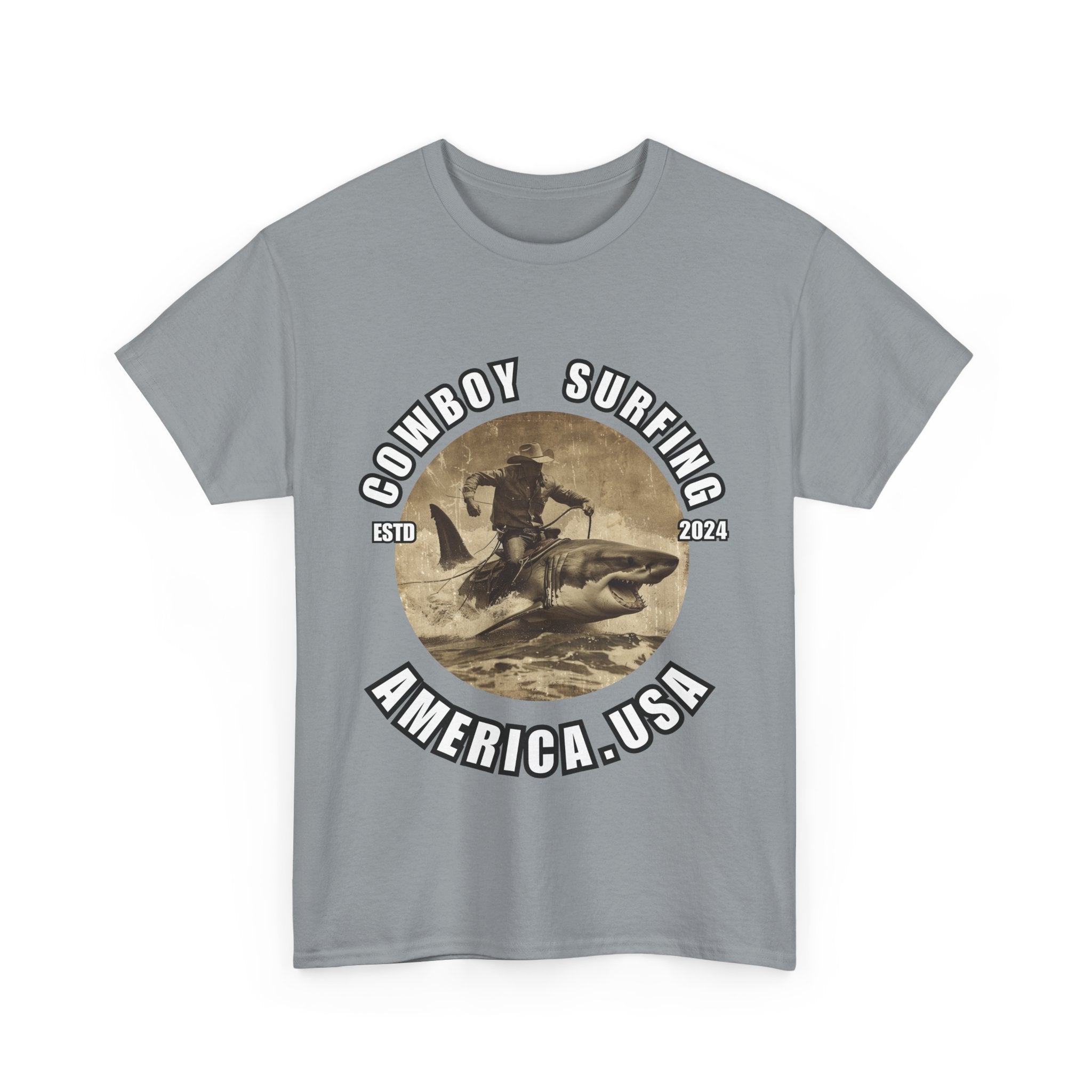 Bold Cowboy Surfing America T-Shirt | Shark-Riding Cowboy Graphic Tee - ESTD 2024"/Unisex Heavy Cotton Tee